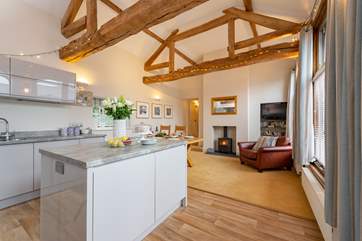 A sleek modern kitchen gives this characterful barn conversion a contemporary feel.