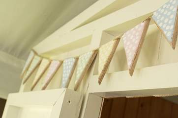 The pretty hand-made bunting.