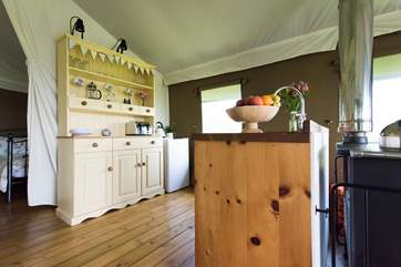 The pretty yellow colour scheme is carried through the tent.