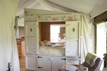 The cute cabin bed.