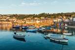 The popular village of Mousehole is only a ten minute drive away.