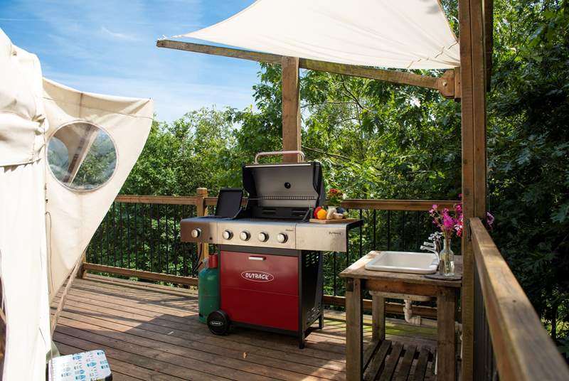 Cook up a storm on the full-size gas barbecue. 