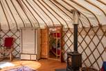 Double doors lead from the main yurt through to the 'baby' yurt.
