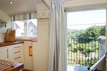 From the kitchen, the stable-door overlooks the stunning view of the valley below.