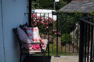 A special seating-area offers guests a place to enjoy the view over the garden and the valley below.