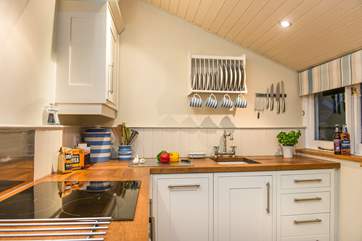The kitchen is a delight to use and well-equipped.