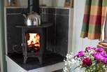 The little wood-burner will keep you very warm on cooler days.