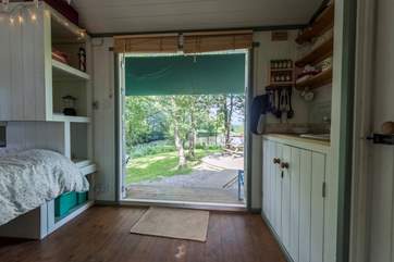 Open up the doors and enjoy that gorgeous view over the lake and countryside beyond.