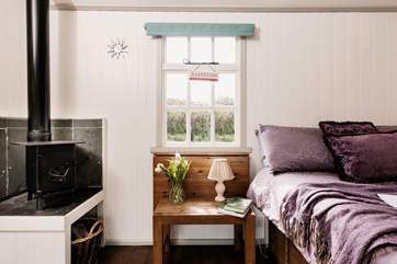 The little wood burner will keep you snug whatever the weather.
