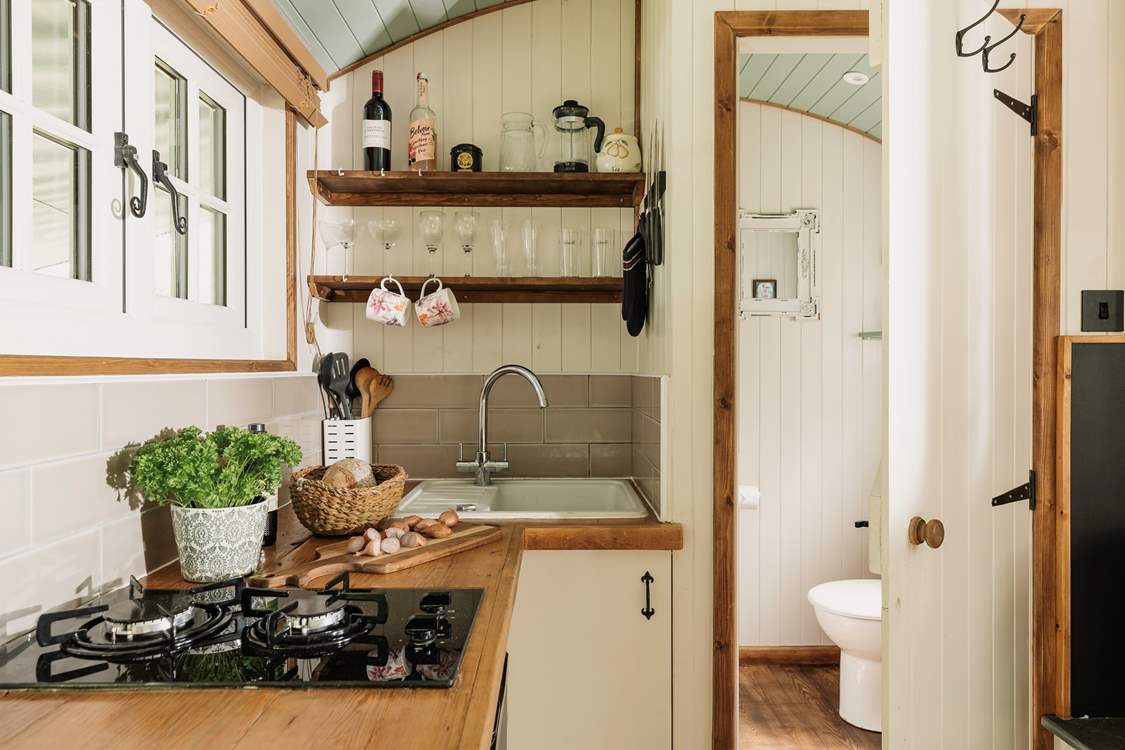 This door leads you through to the ensuite shower room.