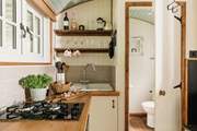 This door leads you through to the ensuite shower room.