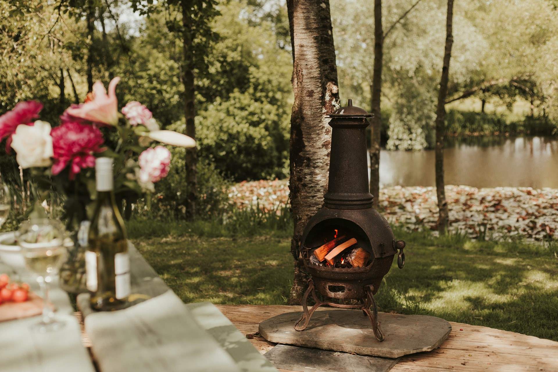 As dusk falls, light the chiminea and stay cosy. 