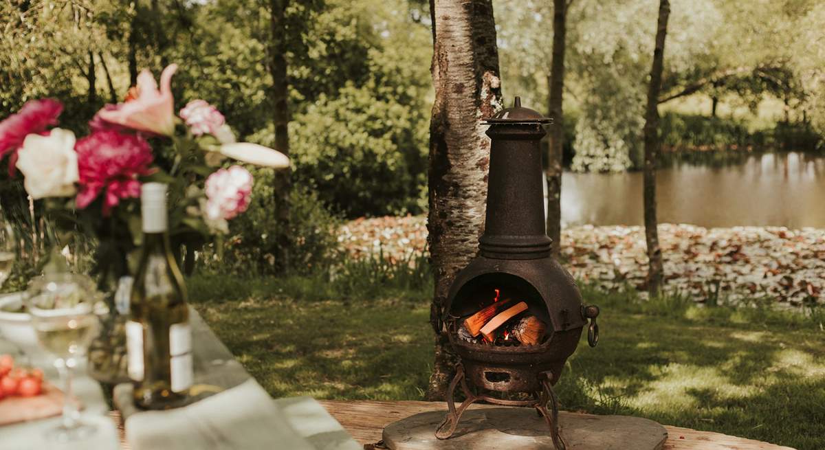 As dusk falls, light the chiminea and stay cosy. 