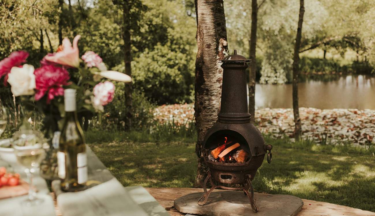 As dusk falls, light the chiminea and stay cosy. 