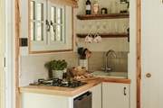 The quaint kitchen has everything you need for your stay in nature.