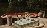 Take to the water on the quaint rowing boat, or enjoy a spot of yoga on the decking.  - Thumbnail Image