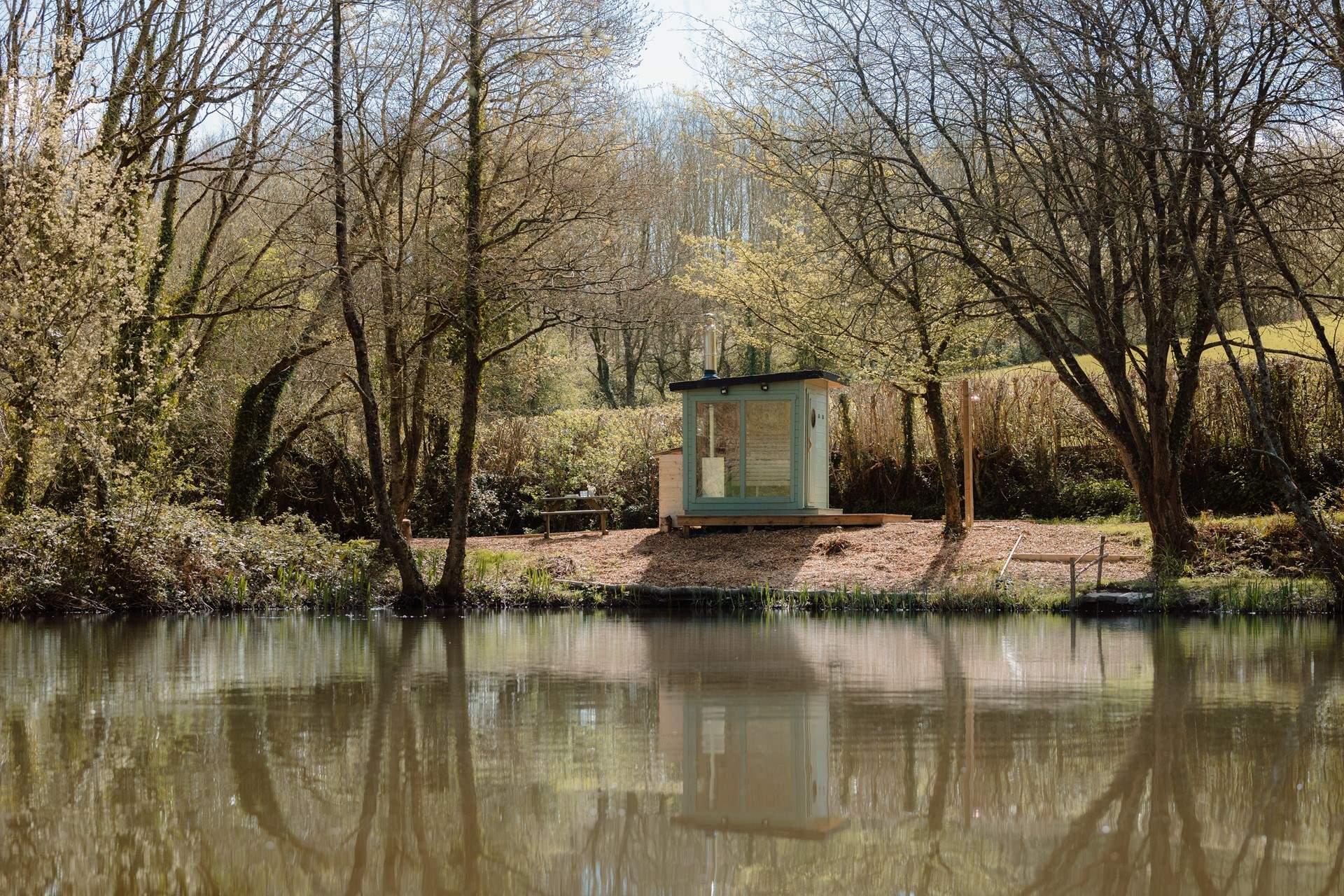 Unwind in the wood-fired sauna, followed by a refreshing cold plunge in the lake.