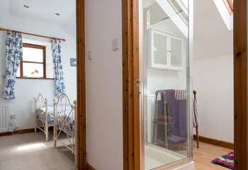 The shower-room is conveniently situated between the two bedrooms.