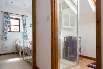 The shower-room is conveniently situated between the two bedrooms.