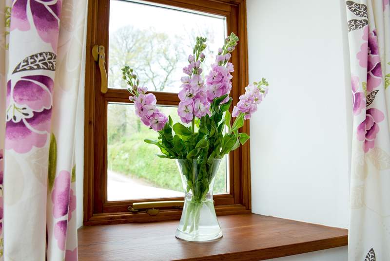 Flowers on the window sill.