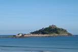 The beautiful St Michael's Mount which sits opposite the golden sands of Marazion beach, is a short drive away (six miles).