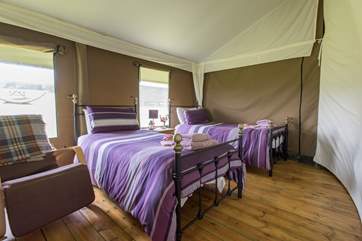 The spacious twin bedroom with lovely bright linens.