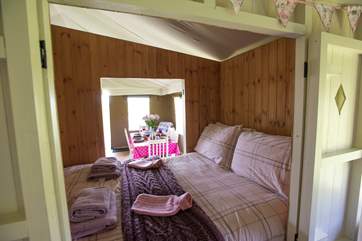Looking into Foxglove's double cabin bed - with access on both sides (one side into the living-area and the other into the twin bedroom).