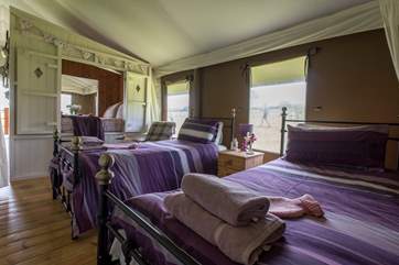 Comfortable beds and lovely bright linens - is this really camping?!