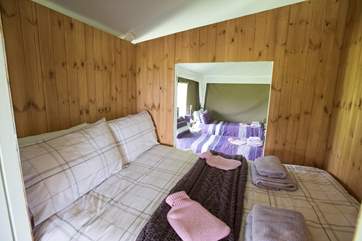 Looking through the cabin bed to the twin bedroom.
