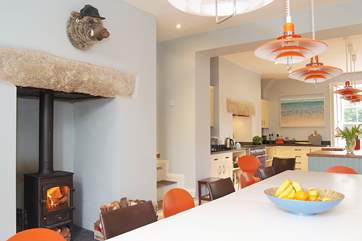 There is a wood-burner at the dining end of the kitchen/dining-room although with under-floor heating throughout the ground floor you are not likely to need it (blizzards being as rare as hen's teeth).