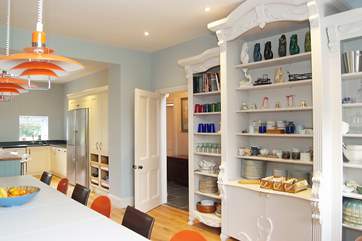 There is a doorway through to the central hallway and sitting-room.