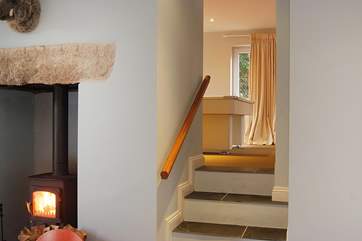 Steps lead up from the kitchen/dining-room to the family/games-room.