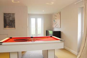 A pool table will help keep everyone occupied if the weather is a little iffy....