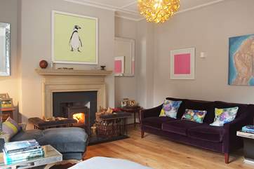 Velvet sofas and armchairs provide ample comfortable seating.
