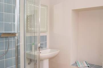 The ground floor shower-room is next to the family/games-room.