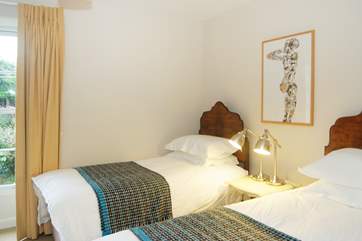 Bedroom 2 has twin beds.