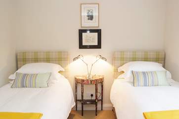 The unusual twin-head anglepoise lamp is one of many vintage finds that furnish the house.