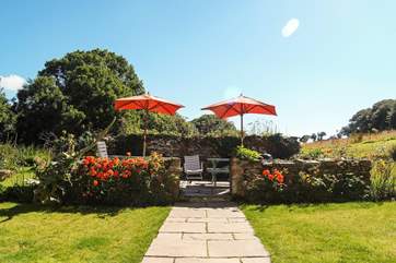 The meadow and orchard are all you can see from the dining-terrace.