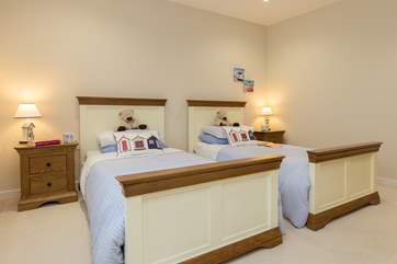 The twin bedroom also looks out to the rear of the Horizon View building. This is a great room for adults and children alike.
