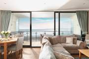 This lovely apartment has a large open plan living/dining/kitchen-area with a full width, sea facing balcony.