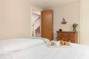 The twin bedroom sits next to to the main bedroom.