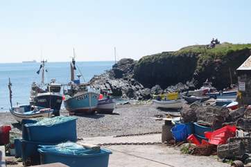 You can watch the fisherman come and go in their colourful fishing boats.