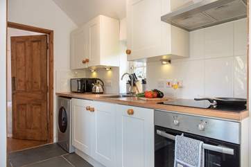 The galley kitchen has everything you might need.