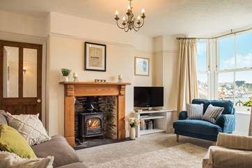 The stylish sitting-room has the most wonderful views.