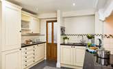 Leading off the kitchen is a utility-area and the shower-room. - Thumbnail Image