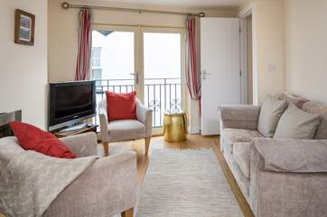 The living area is a great space to relax and reflect on your day's adventures.