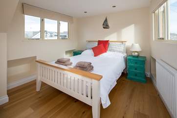 The double room on the top floor is beautifully light and airy.