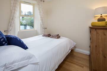 Bedroom 1 on the first floor is super inviting.