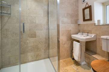The ground floor shower-room is equipped with this huge shower. Perfect for washing the day's sand and sun cream away.