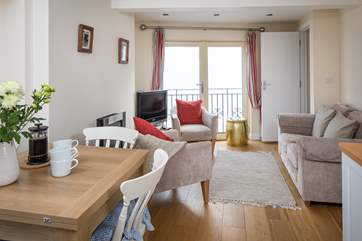 The open plan design of the living and dining-area is cosy yet offers plenty of space for four.